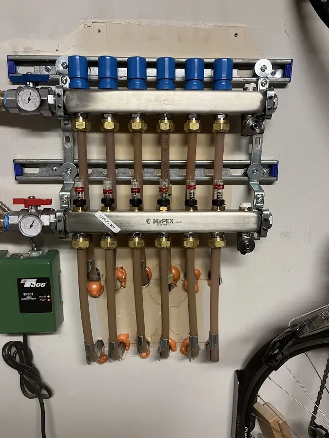 Plumber performing Gas Leak Detection at a residential property in Kenmore